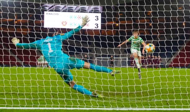 Kris Ayer scores the winning penalty 