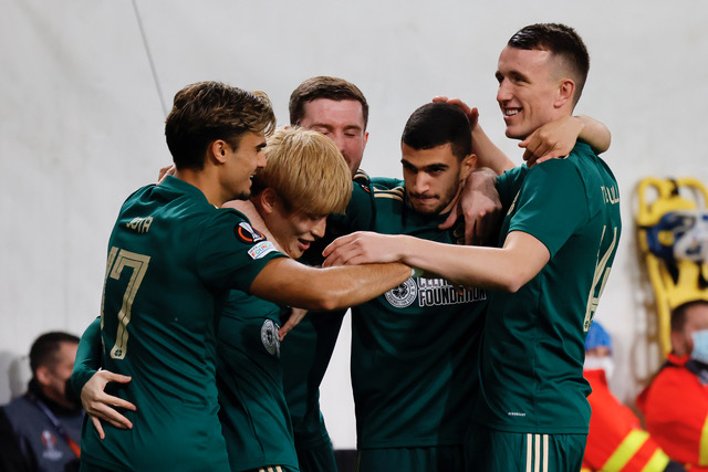 Teammates of Ferencvarosi TC celebrate after the UEFA Europa