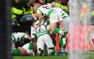 Christopher Jullien is mobbed by teammates