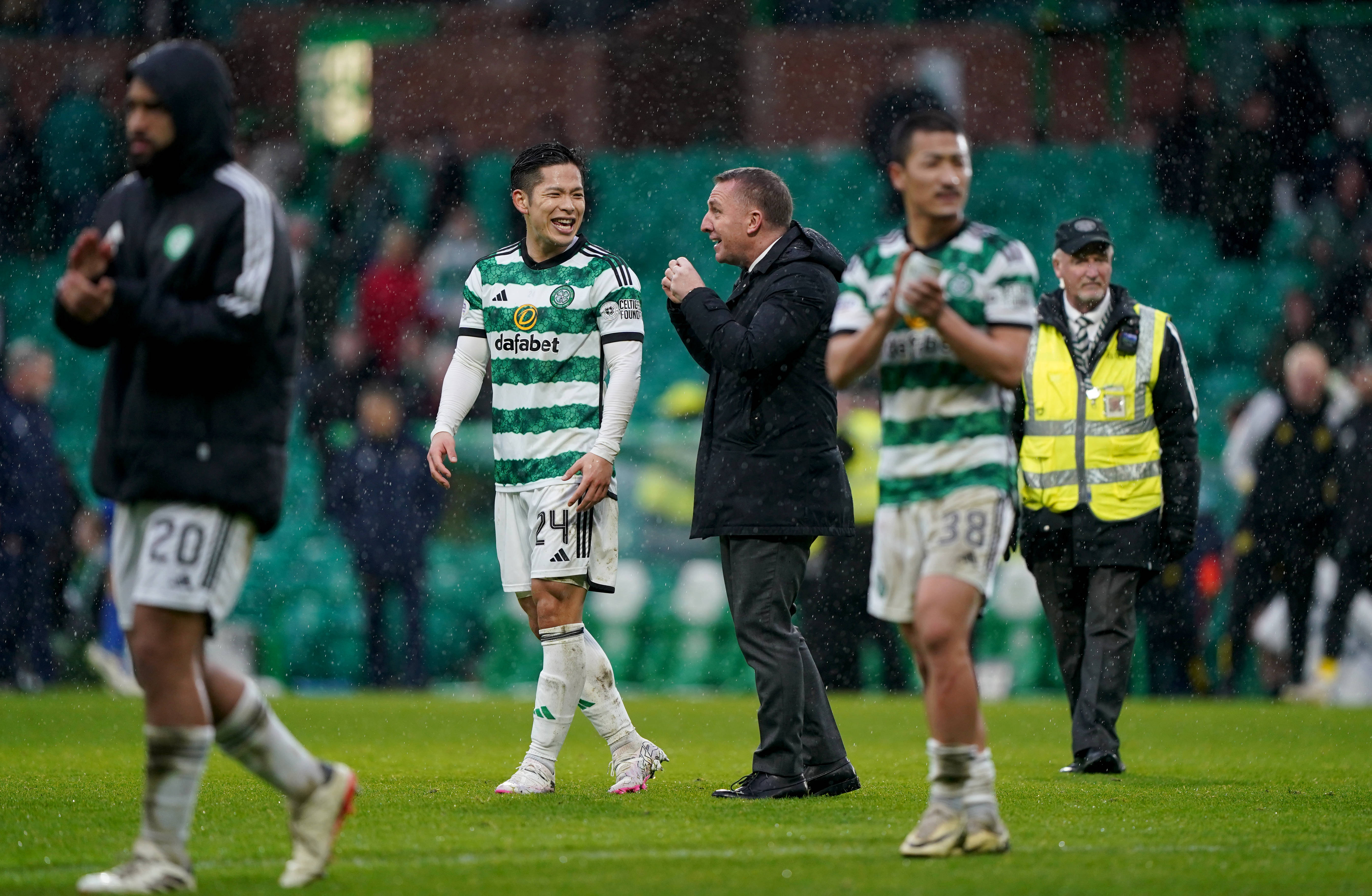 Tomoki Iwata with Brendan Rodgers