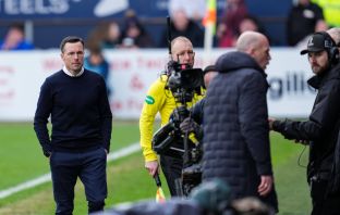 Clement passes on shaking Don Cowie's hand