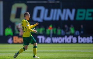 Callum McGregor celebrates after scoring at Easter Road