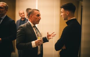 Brendan Rodgers chats to Kieran Tierney at the Celtic FC Foundation event in London