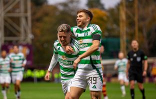 Luke McCowan and James Forrest celebrate