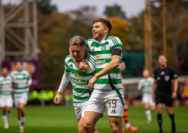 Luke McCowan and James Forrest celebrate