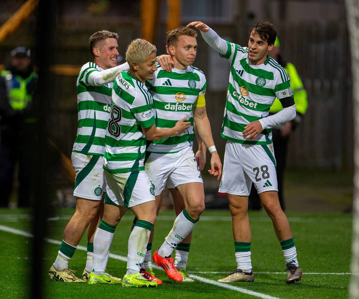 Alistair Johnston is congratulated by his teammates