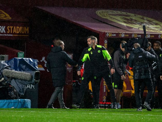 Manager's shake hands at full time