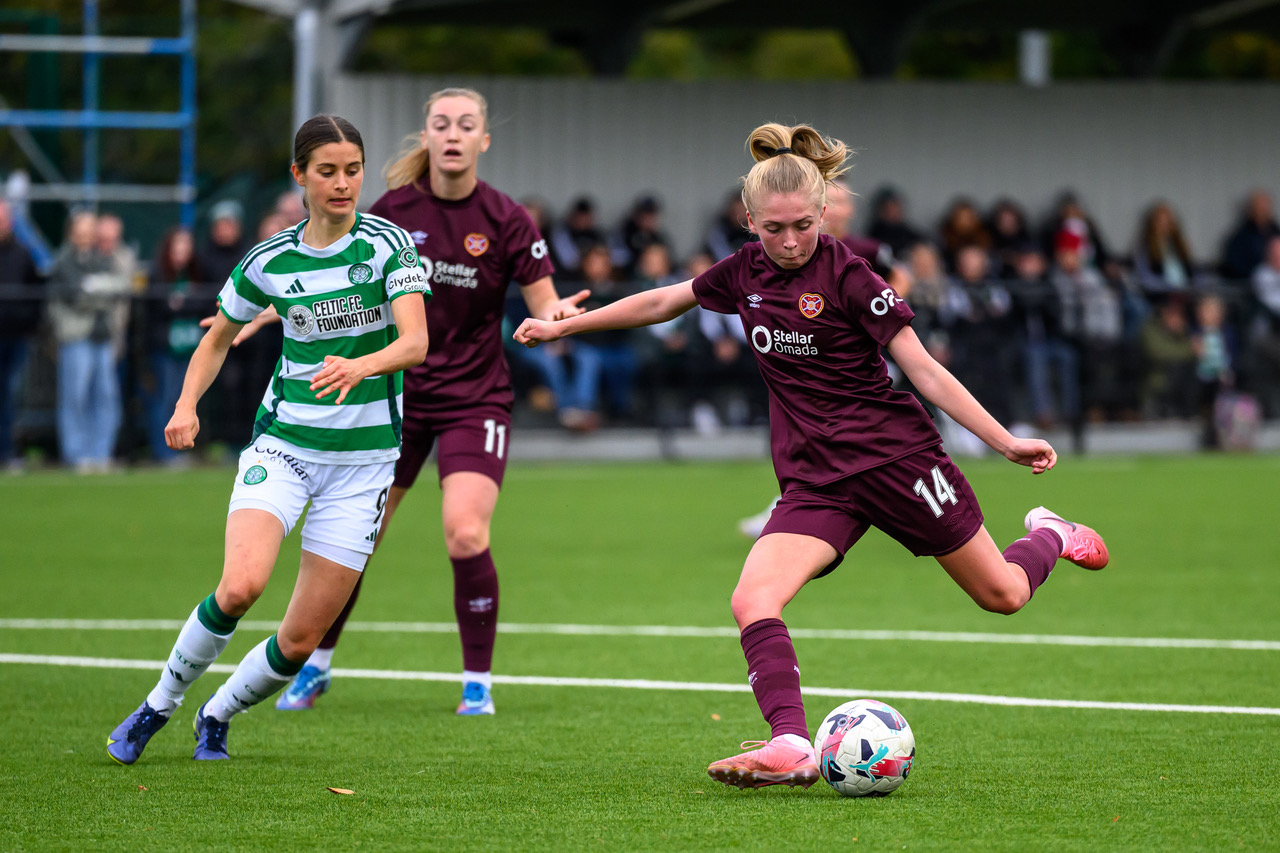 Kayla Jardine deflects off Maria McAneny to give Hearts the lead