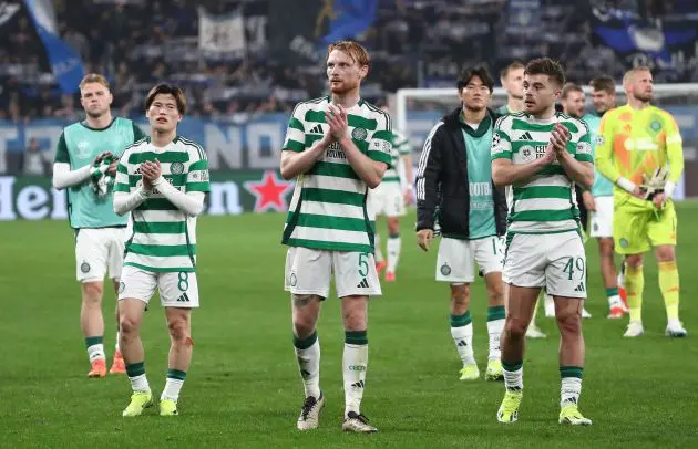 Celtic players applaud the support