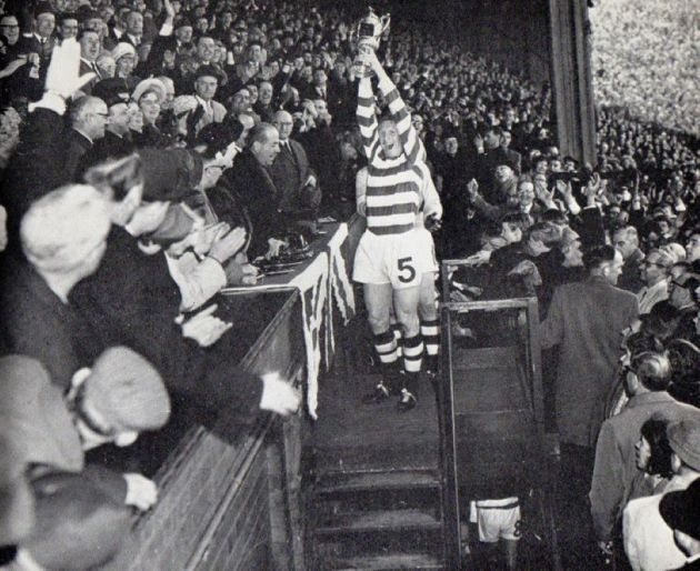 Billy McNeill lifts the League Cup after the win over Rangers