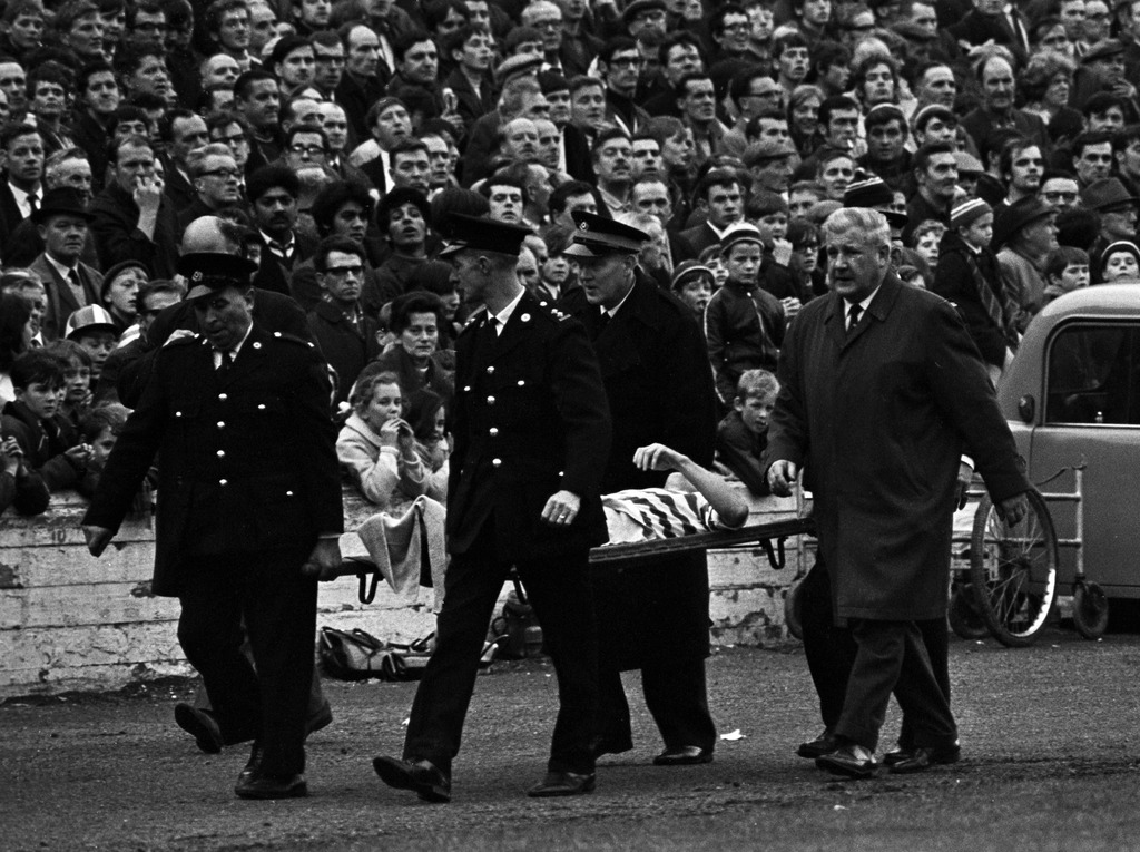 Stevie Chalmers carried off with a broken leg 