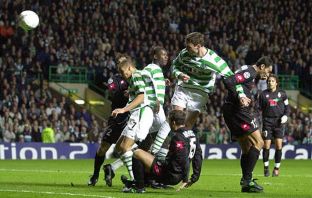 Chris Sutton of Celtic scores
