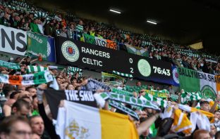 Celtic fans celebrate at Ibrox
