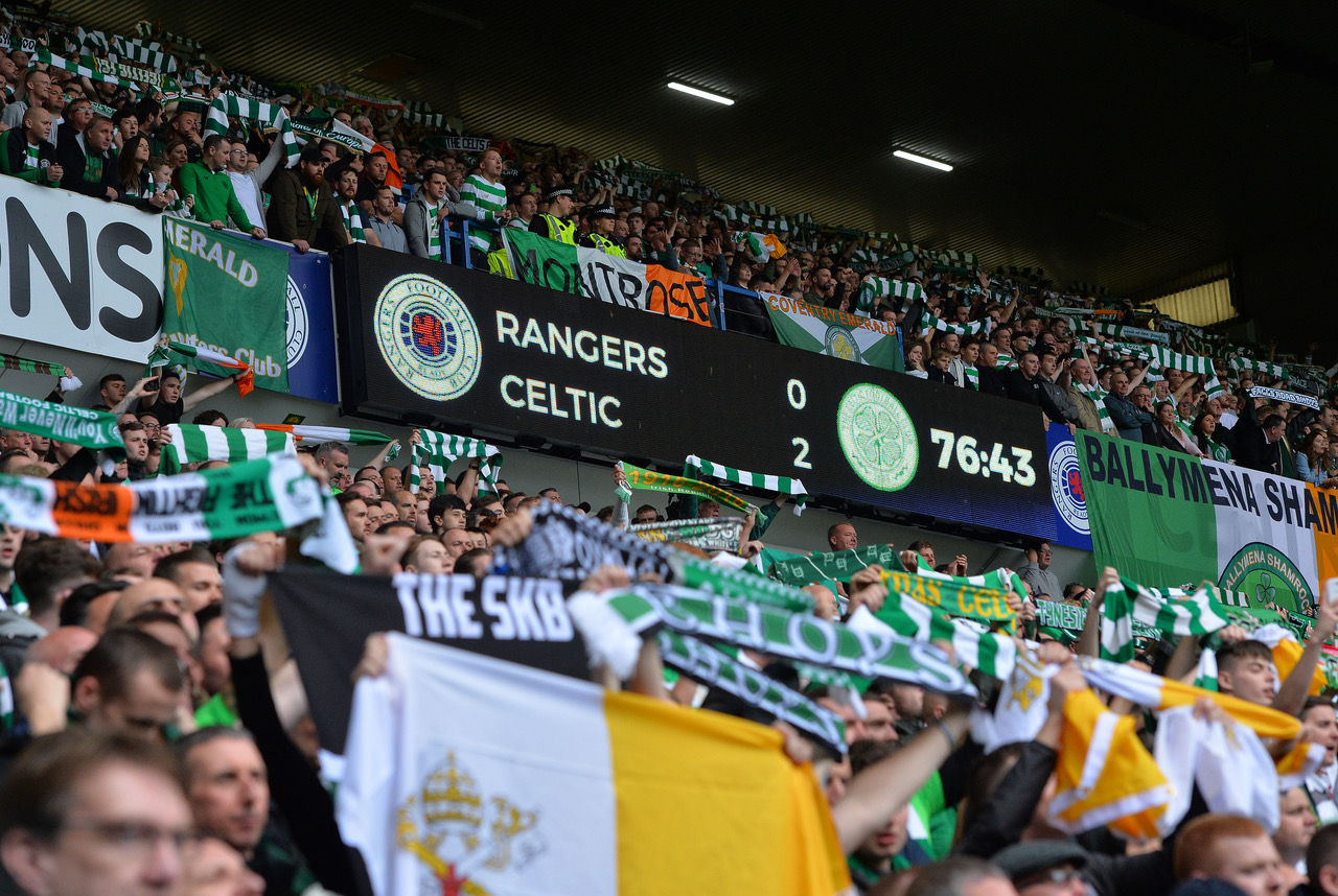 Celtic fans celebrate at Ibrox 