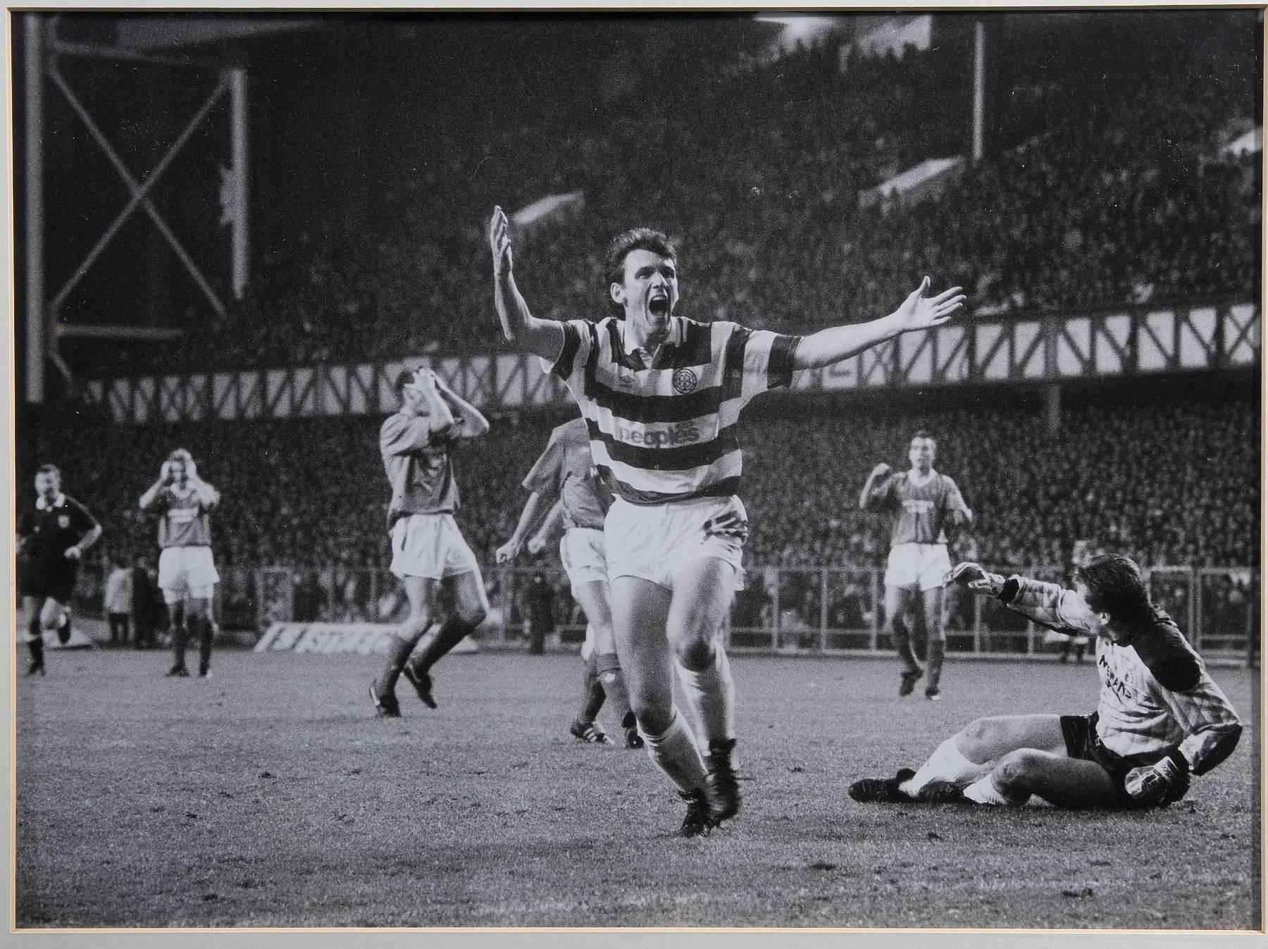 Tony Cascarino scores at Ibrox