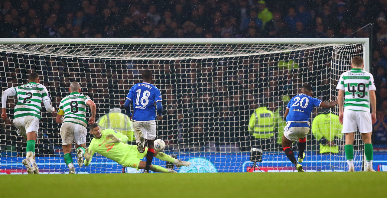 Fraser Forster saves the penalty 