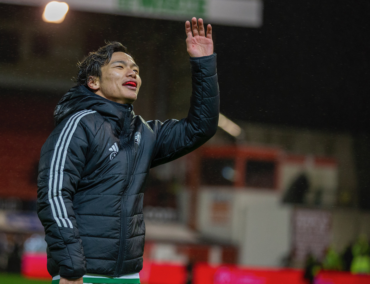 Reo Hatate celebrates