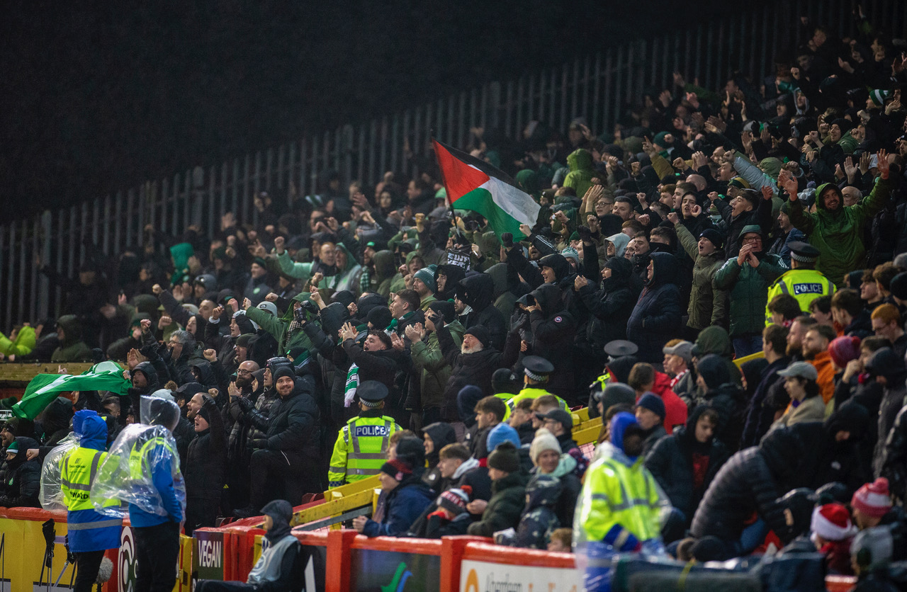 The Celtic support at Pittodrie