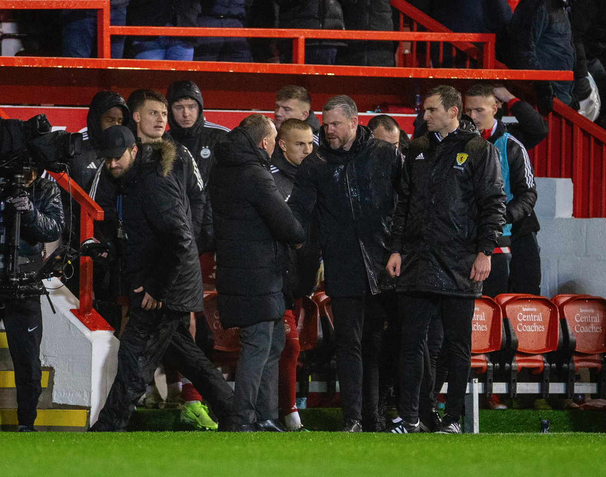 Brendan Rodgers shakes hands with Jimmy Thelin