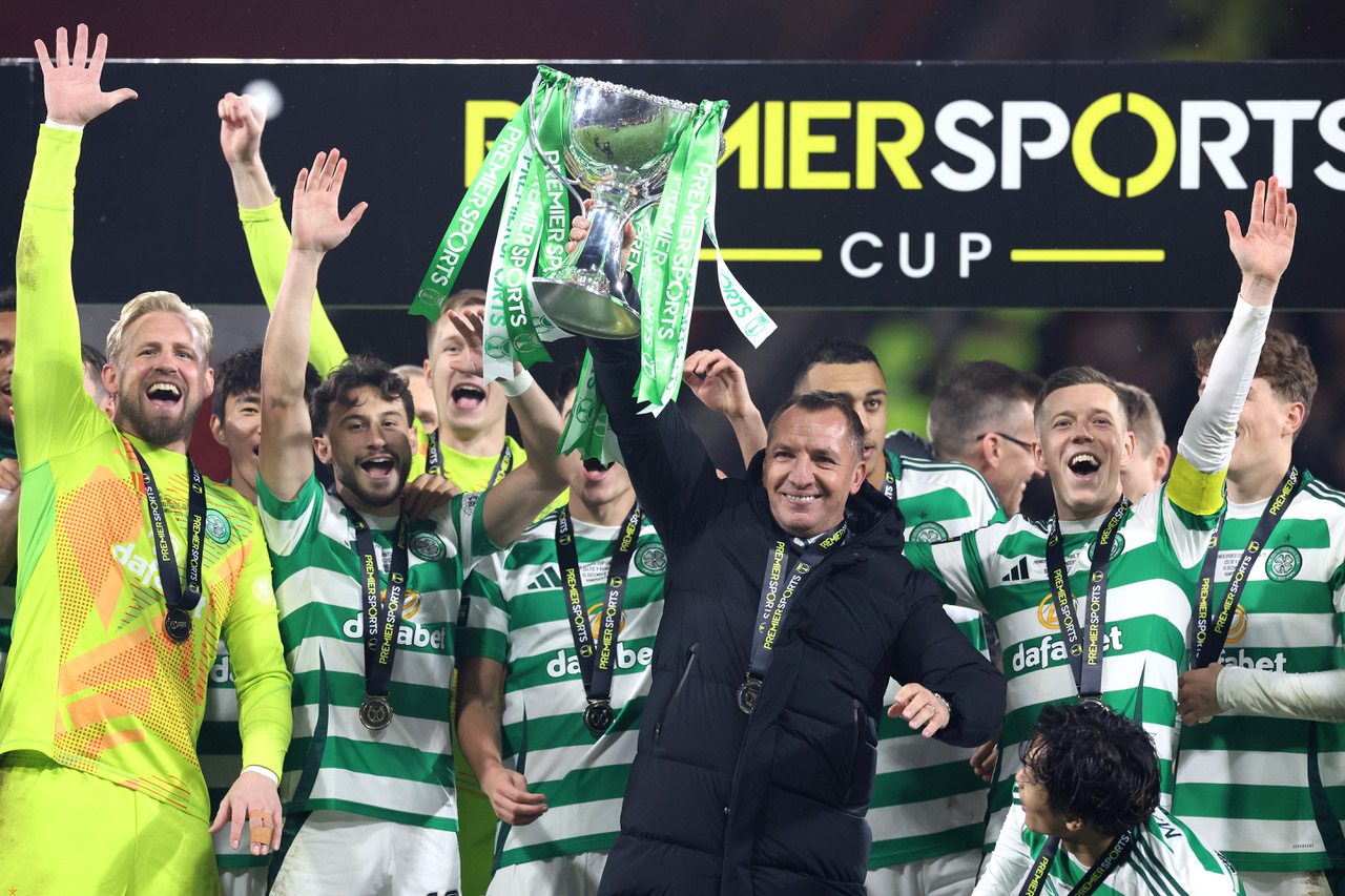 Brendan Rodgers lifts the cup