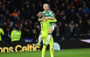 Daizen Maeda and Kasper Schmeichel celebrate