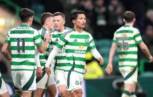 Reo Hatate celebrates