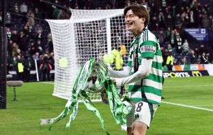 Kyogo celebrates with the cup