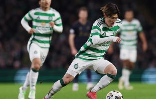 Kyogo runs with the ball