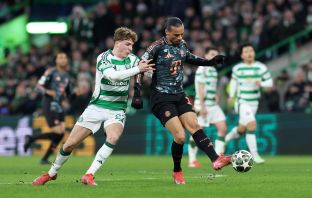 Leroy Sane is challenged by Arne Engels