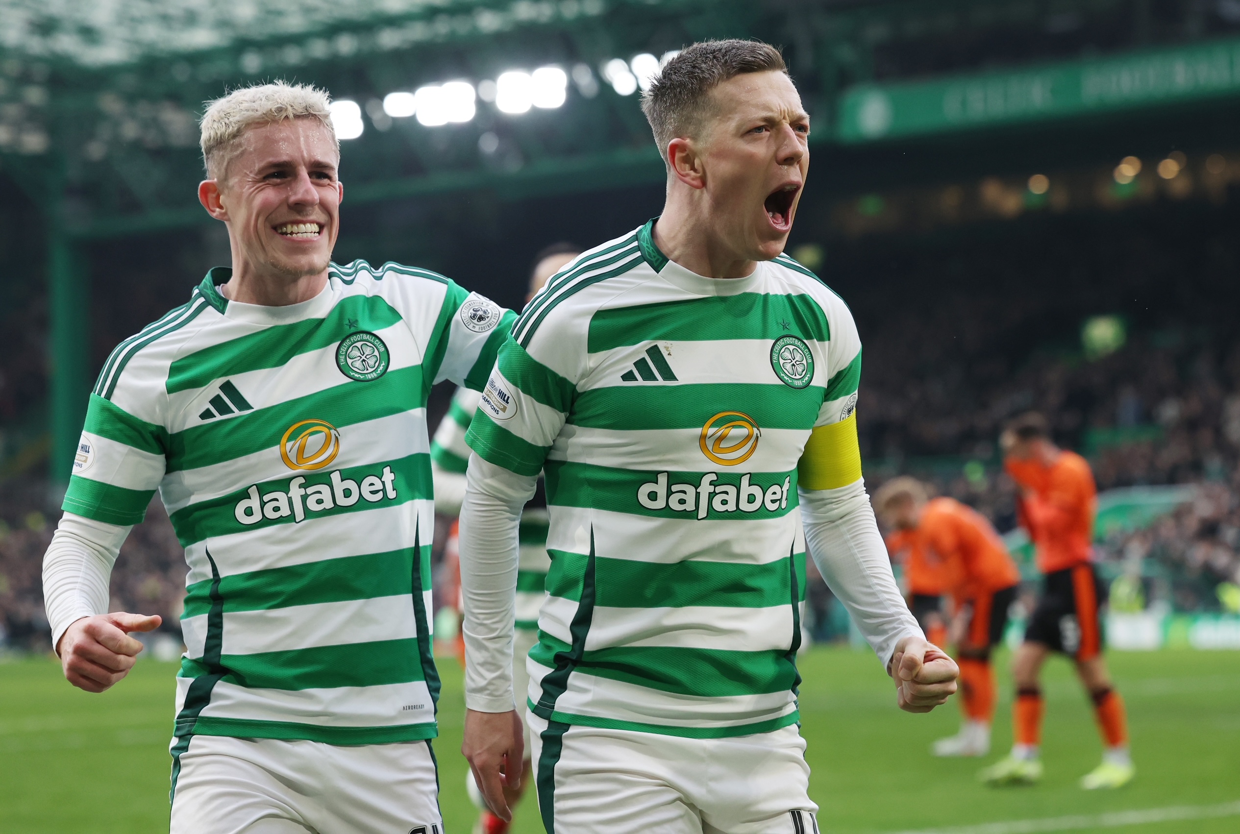 Callum McGregor celebrates with Luke McCowan