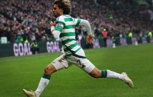 Jota of Celtic celebrates