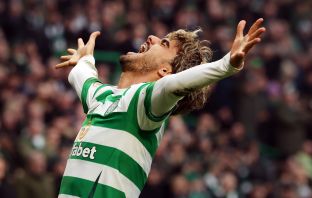 Jota of Celtic celebrates
