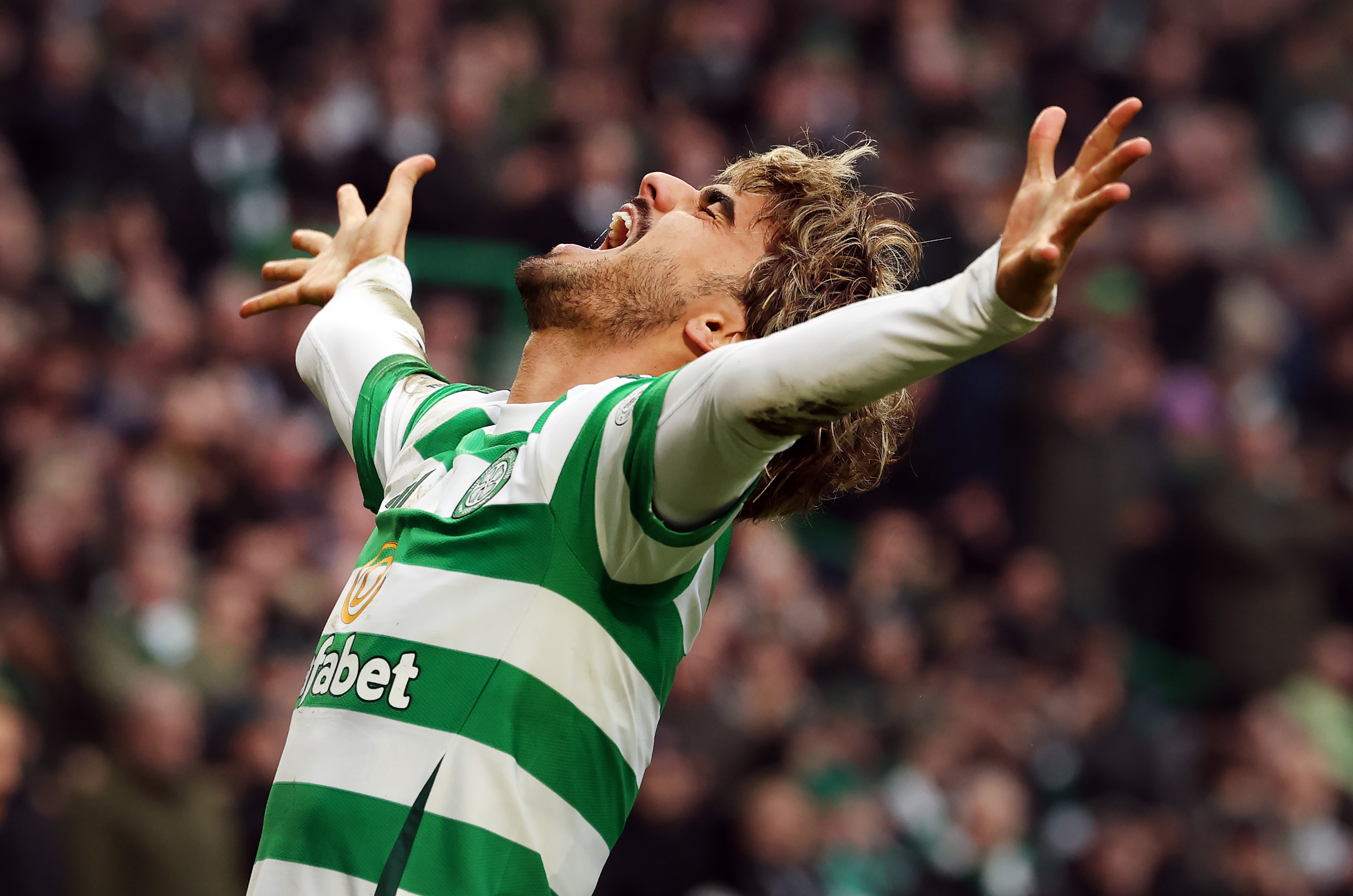 Jota of Celtic celebrates