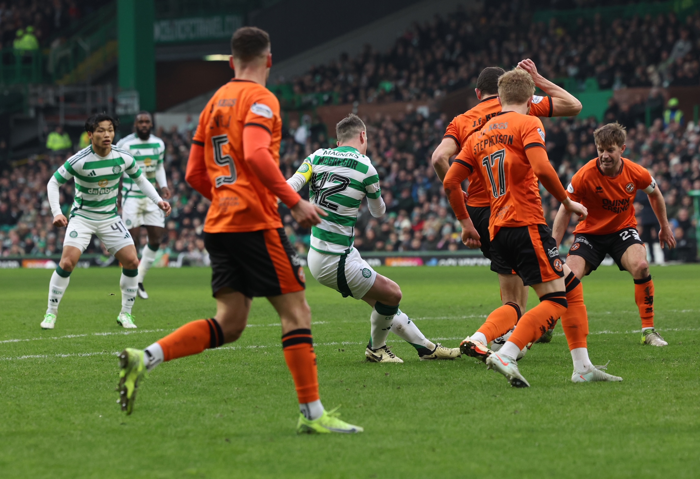 Callum McGregor scores