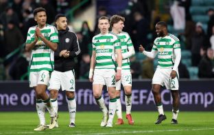 Celtic players applaud the support