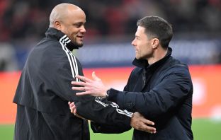 Vincent Kompany and Xabi Alonso
