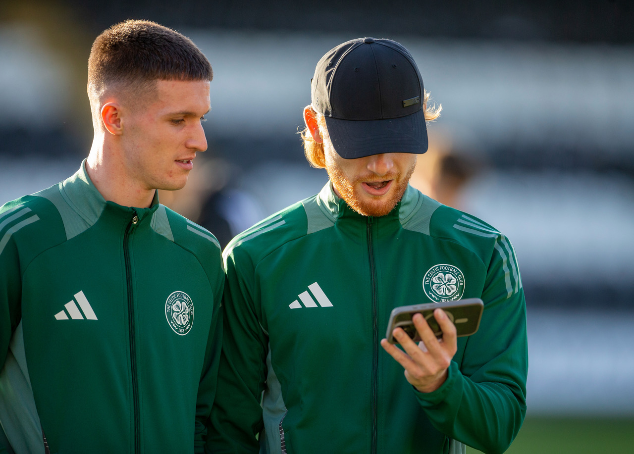 Johnny Kenny and Liam Scales checking the results