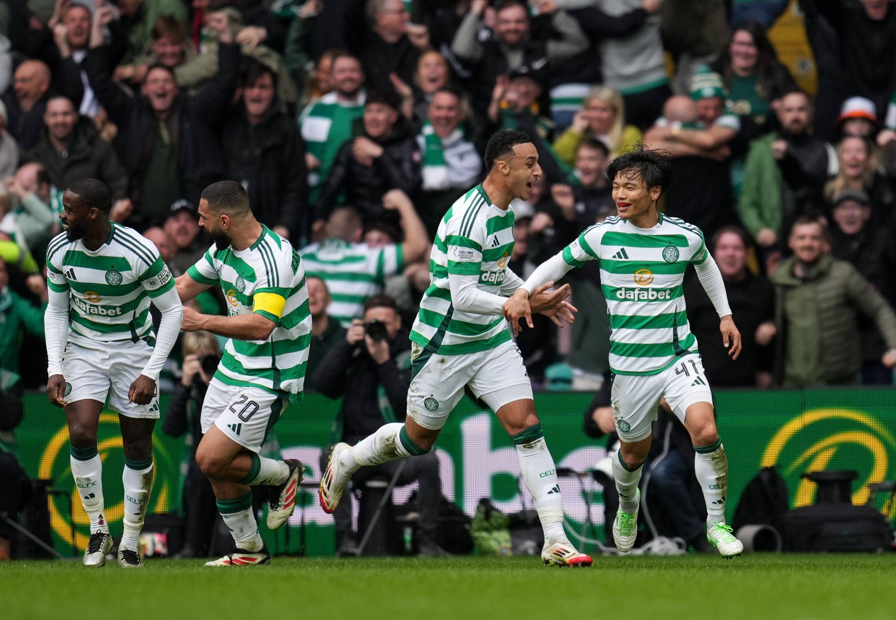 Reo Hatate celebrates