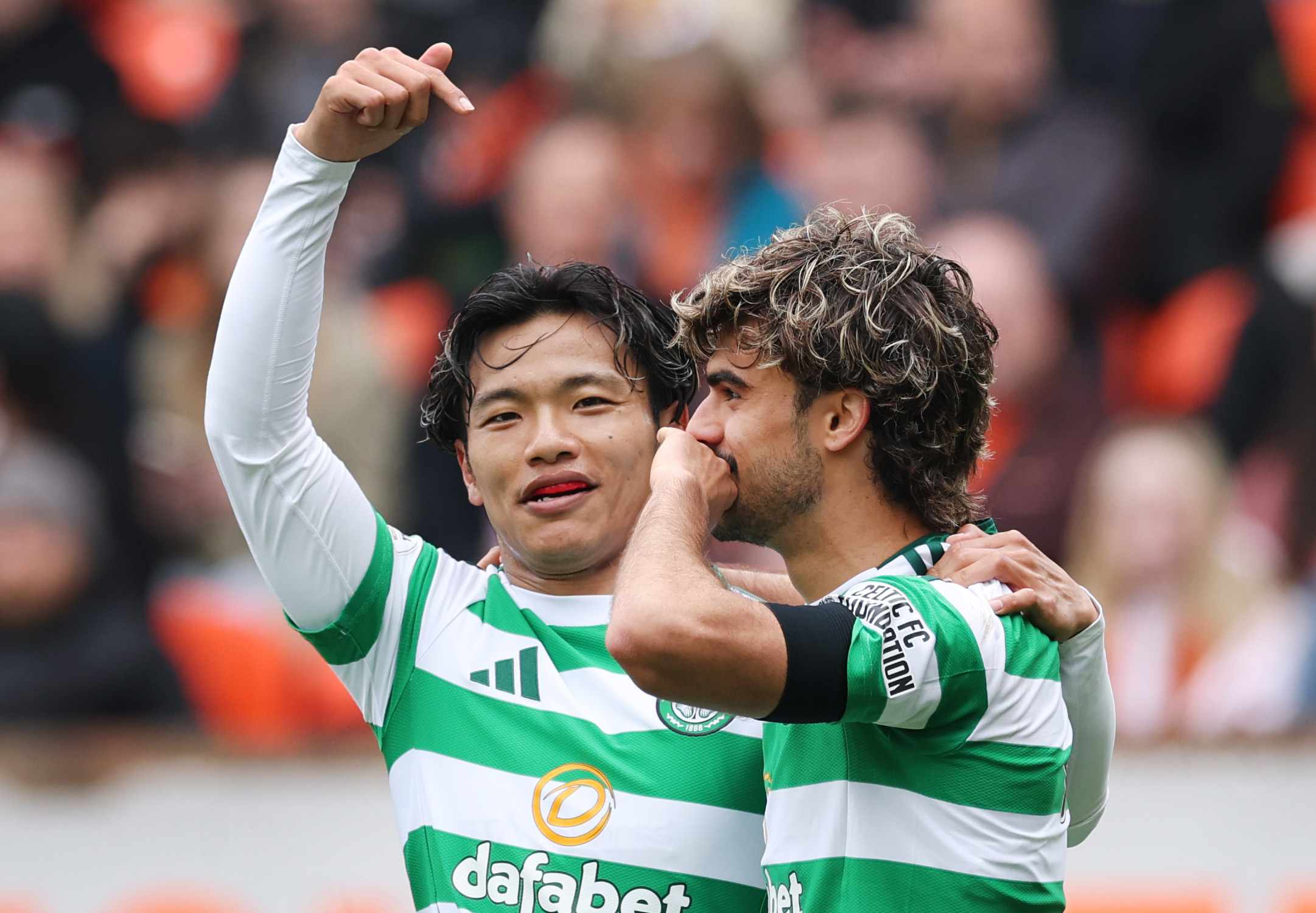 Reo Hatate and Jota celebrate