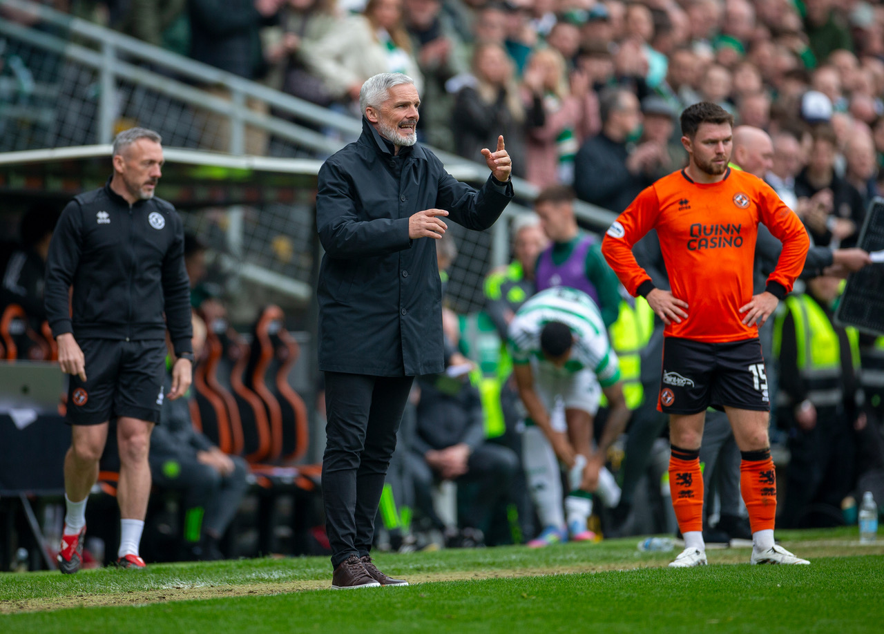 Jim Goodwin looks on