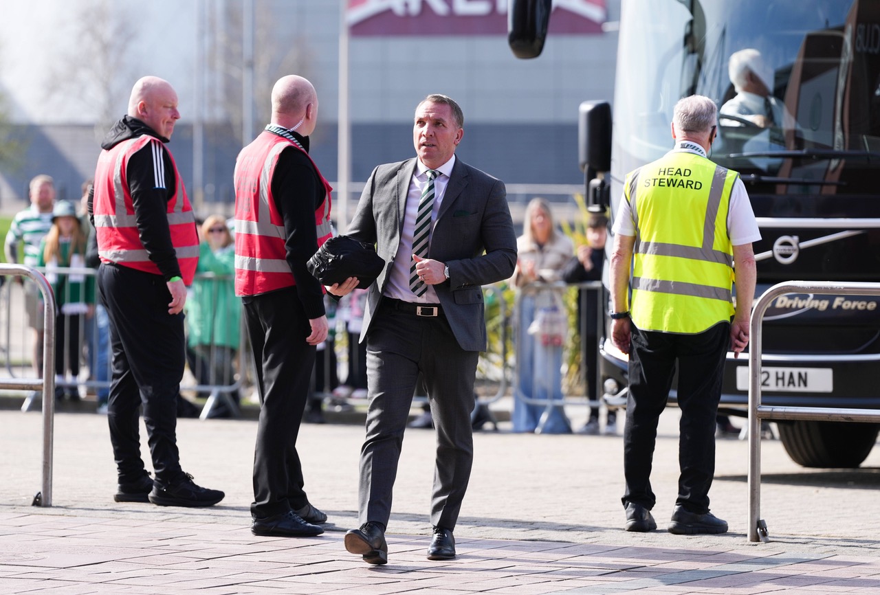 Brendan Rodgers steps off the Celtic team bus