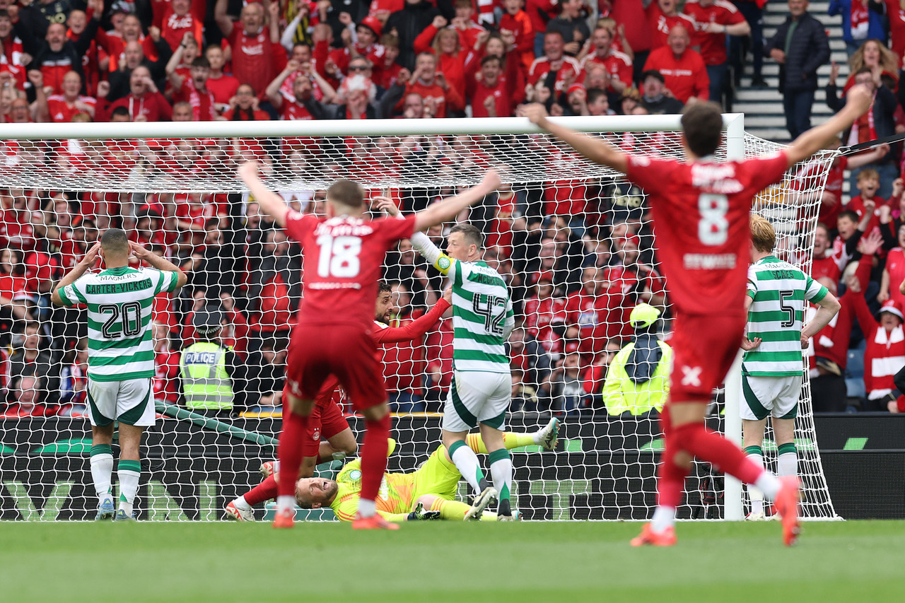 Kasper Schmeichel of Celtic concedes an own goal