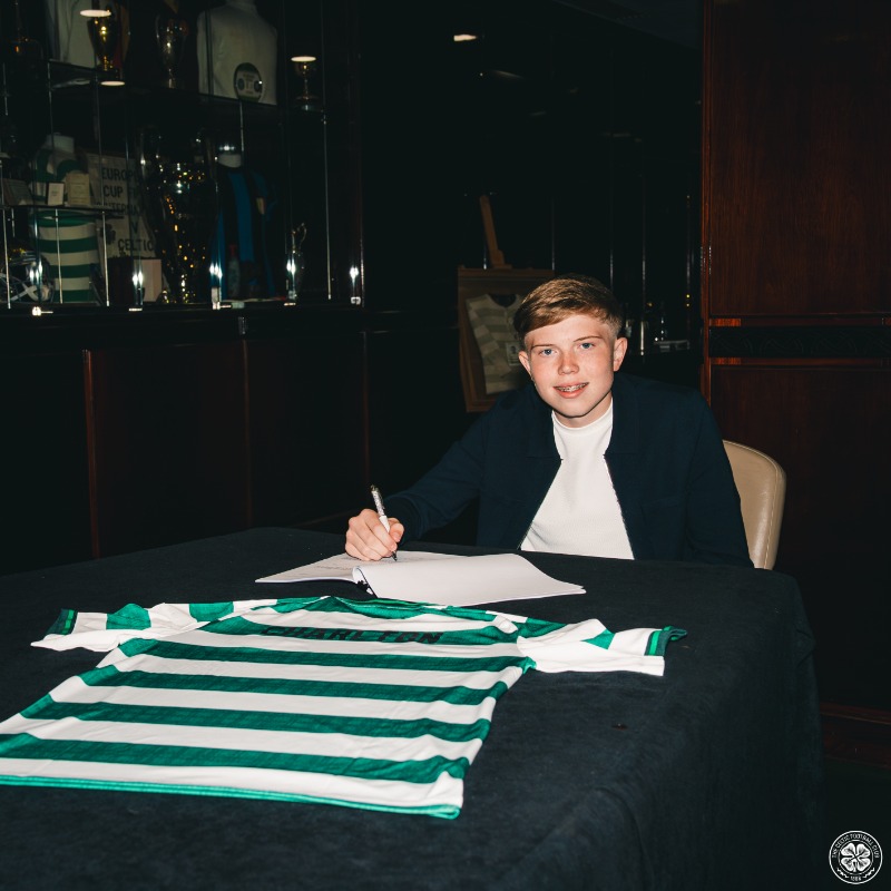 Michael Charlton signs his first professional contract with Celtic