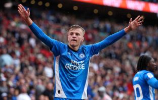 Harley Mills of Peterborough United celebrates