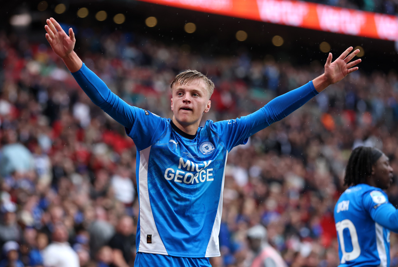 Harley Mills of Peterborough United celebrates