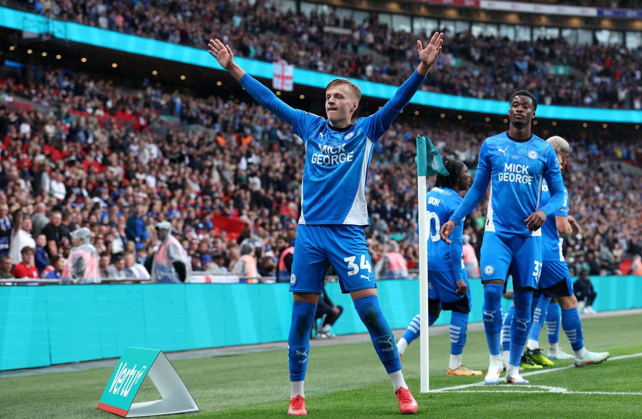 Harley Mills of Peterborough United celebrates