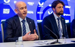 Russell Martin talks with the media alongside Chief Executive Officer Patrick Stewart