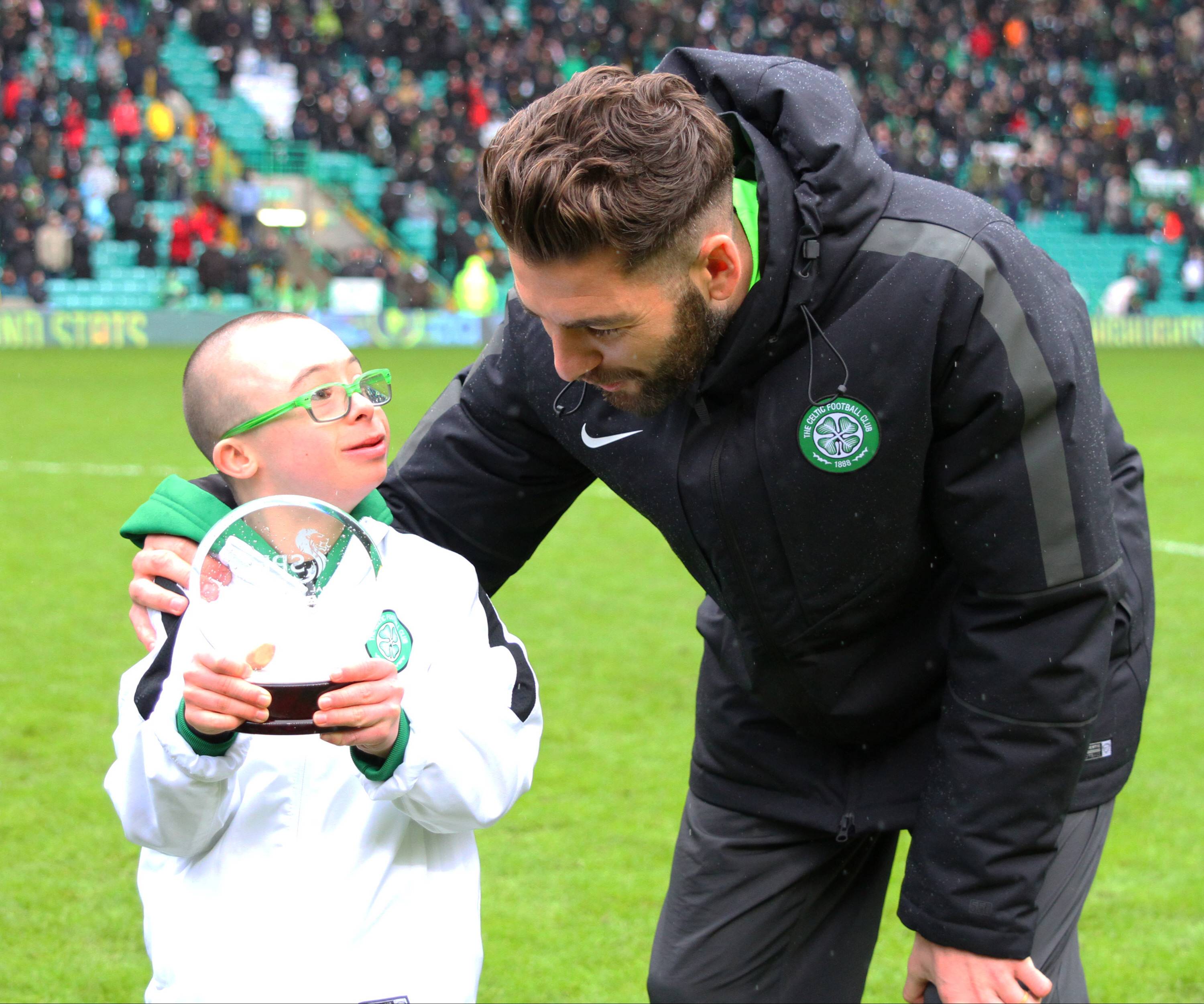 Jay Beatty receives His Award From Charlie Mulgrew