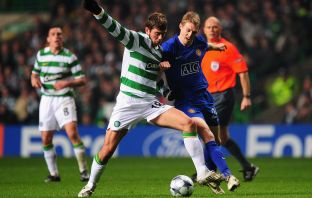 Massimo Donati of Celtic battles for the ball with Darren Fletcher of Manchester United