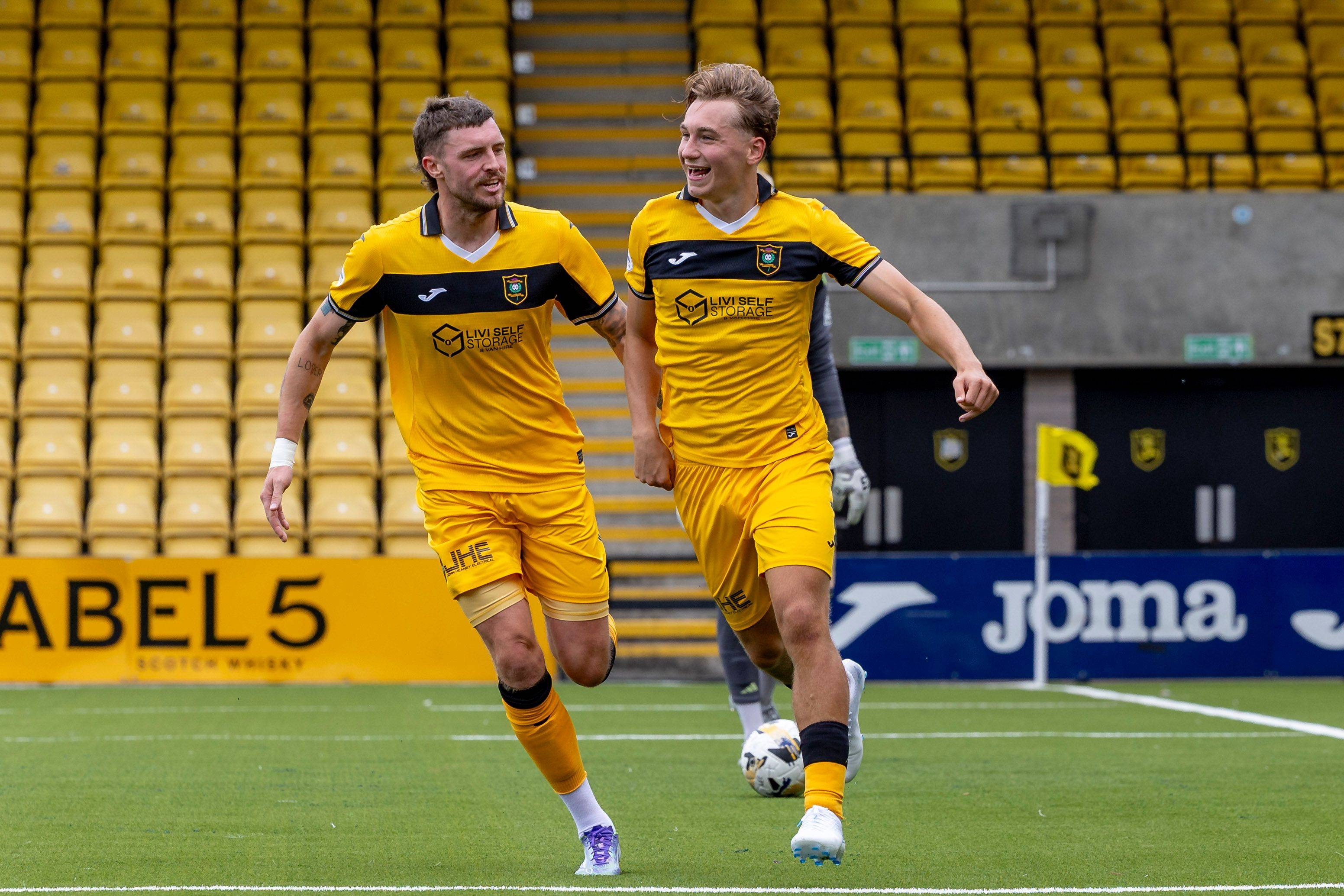 Adam Montgomery of Livingston celebrates
